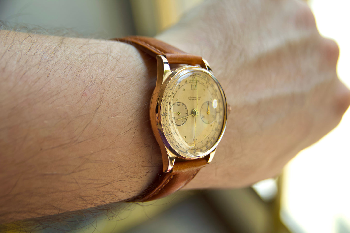 Orologio "Cronographe Suisse" anni 50 in oro 18kt