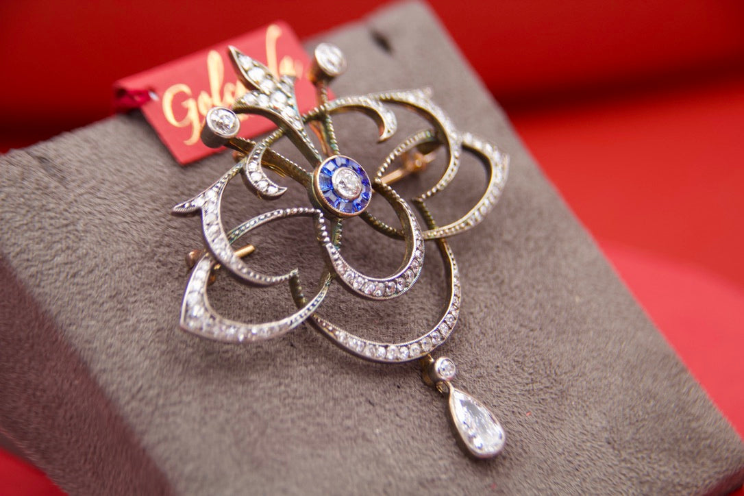 Important "1920s" pendant brooch with drop diamond