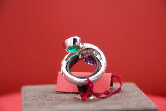 Toi moi ring with sapphire and emerald