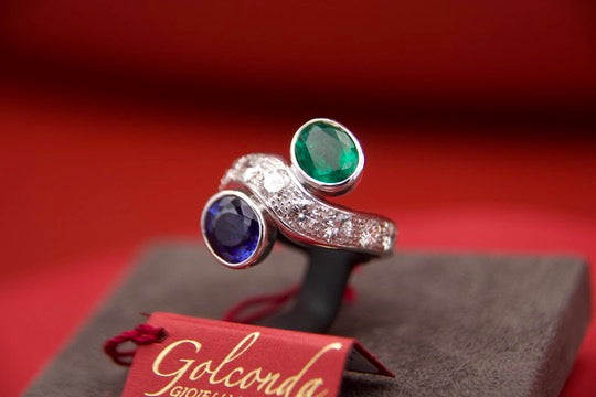 Toi moi ring with sapphire and emerald