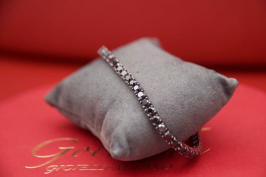Gold bracelet with black diamonds