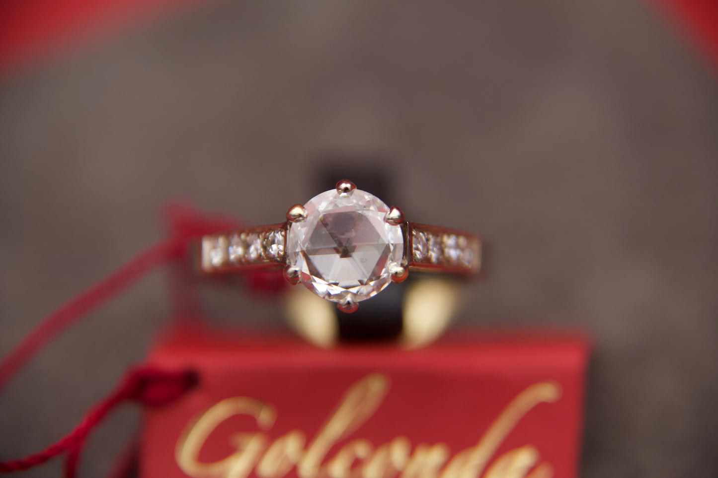 Solitaire ring with rosette