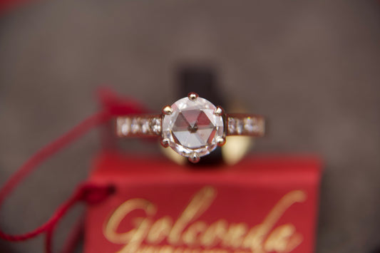 Solitaire ring with rosette