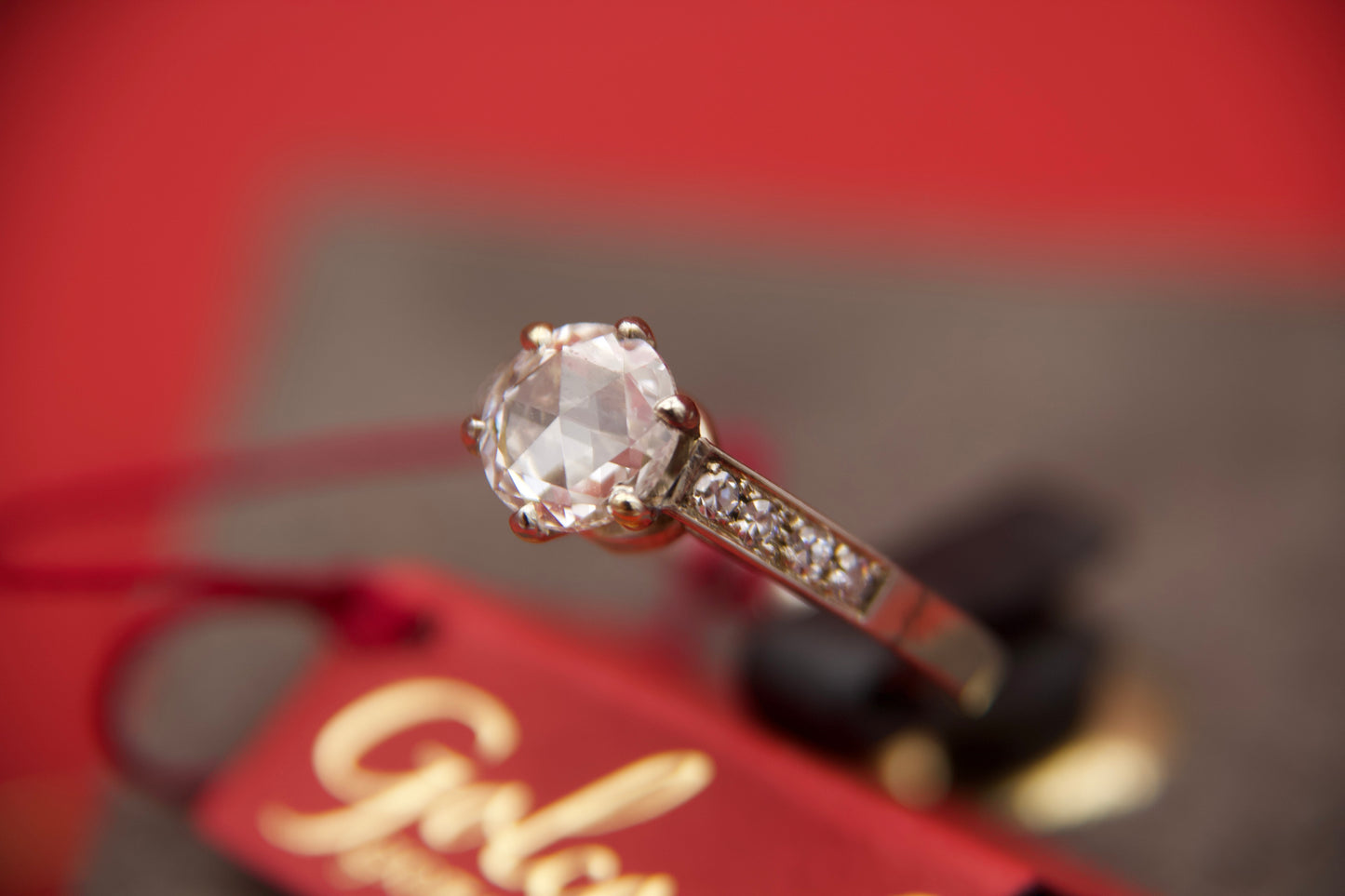 Solitaire ring with rosette