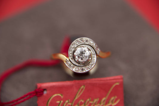 Tourbillon ring with diamonds
