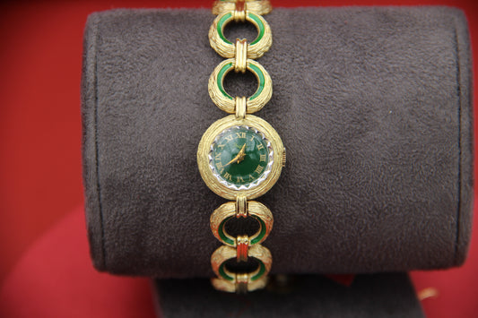 Gold watch with enamel