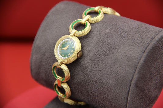 Gold watch with enamel