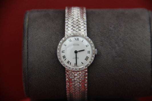 Gold watch with diamonds