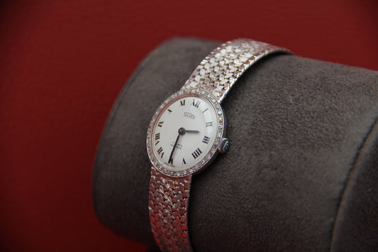 Gold watch with diamonds