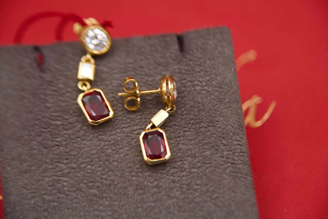 Orecchini pendenti con diamanti e rubini