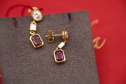 Orecchini pendenti con diamanti e rubini