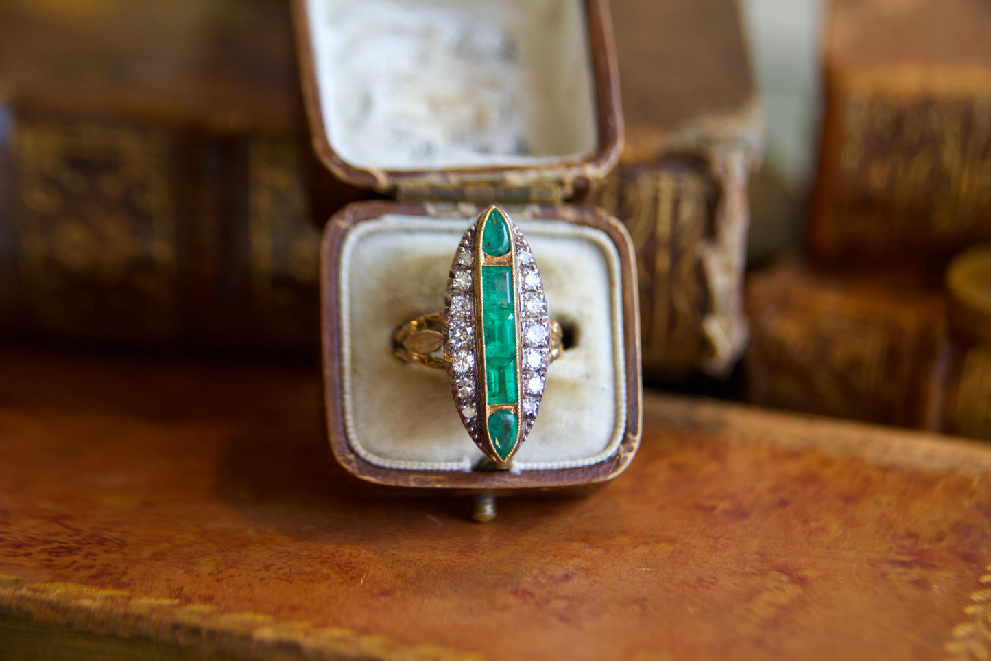 Art Nouveau marquise ring with emeralds