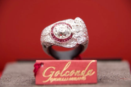 Art Deco ring with 2.40-carat diamond and calibrated rubies