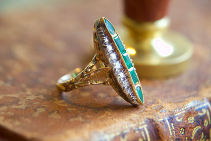 Art Nouveau marquise ring with emeralds