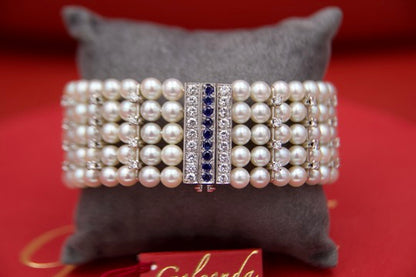 Semi-rigid bracelet with 1950s pearls
