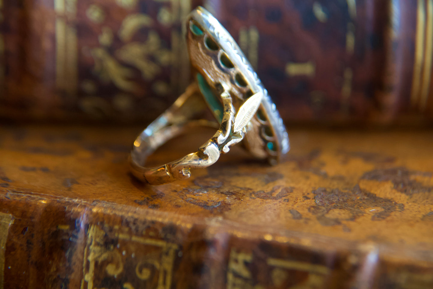 Art Nouveau marquise ring with emeralds