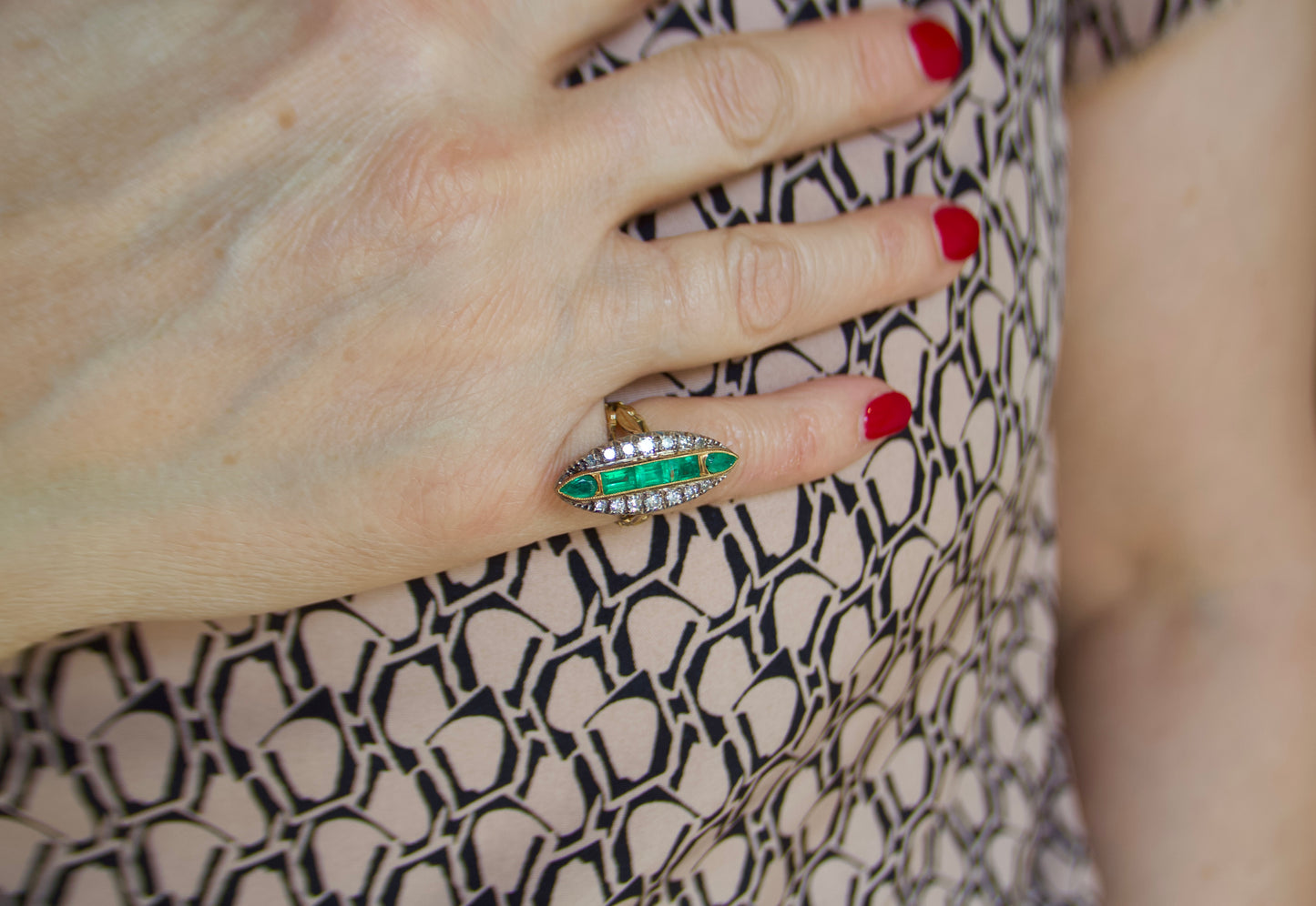 Art Nouveau marquise ring with emeralds