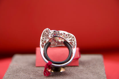 Art Deco ring with 2.40-carat diamond and calibrated rubies