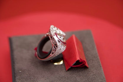 Art Deco ring with 2.40-carat diamond and calibrated rubies