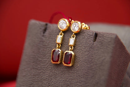 Orecchini pendenti con diamanti e rubini