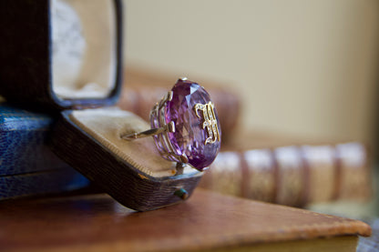 Ring with amethyst and monogram