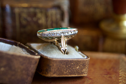 Art Nouveau marquise ring with emeralds