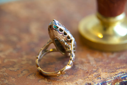Art Nouveau marquise ring with emeralds