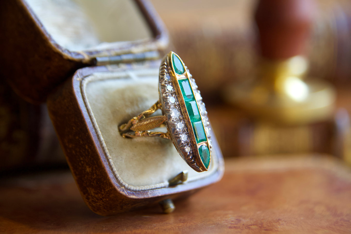 Art Nouveau marquise ring with emeralds