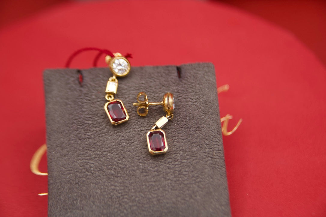 Orecchini pendenti con diamanti e rubini