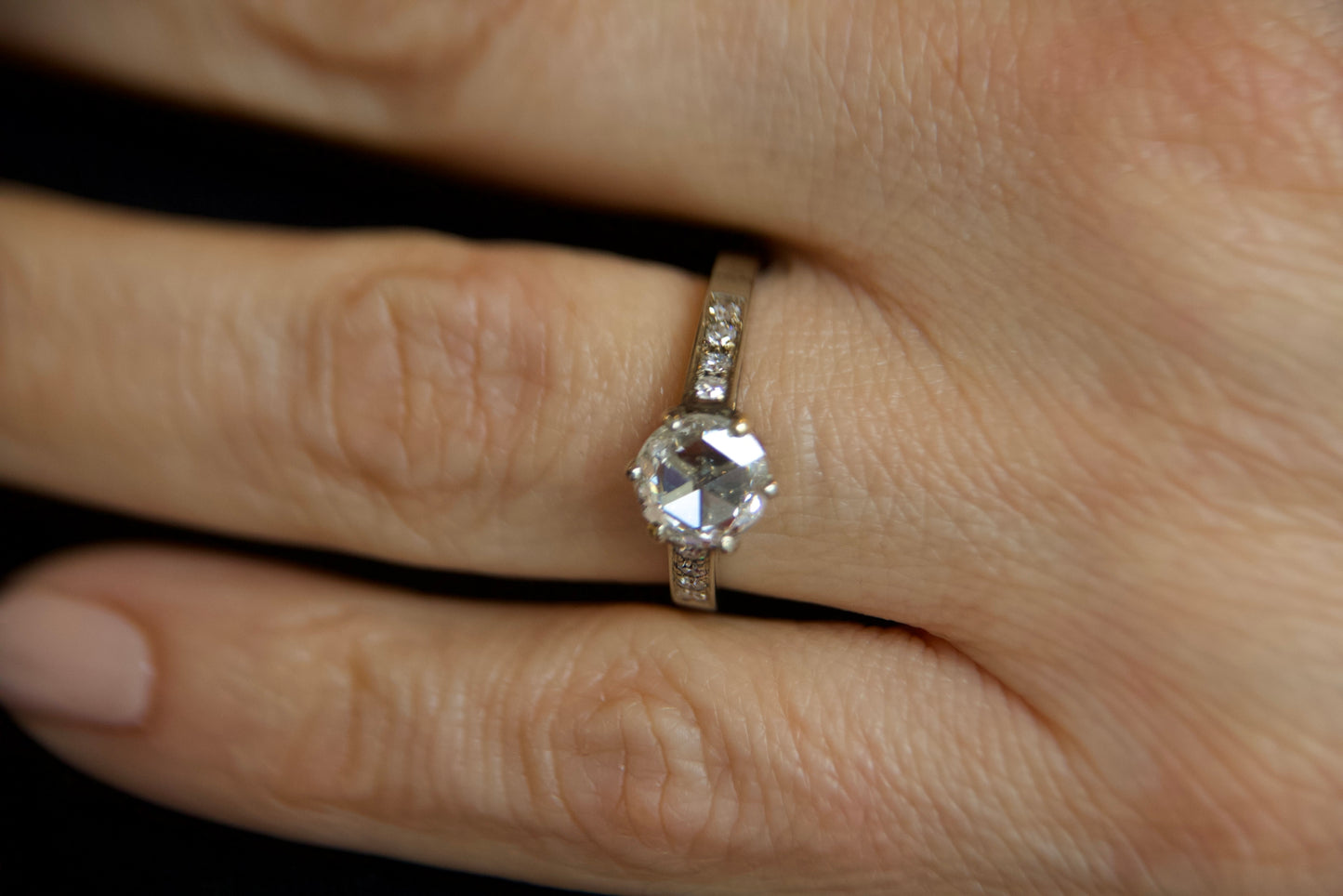 Solitaire ring with rosette