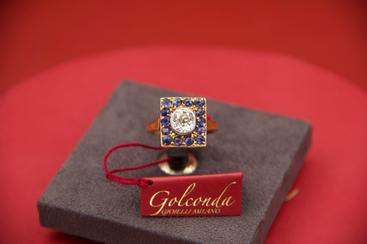 Diamond and sapphire shield ring 
