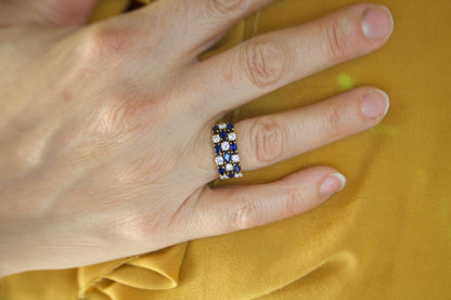 Anello fascia con zaffiri e diamanti
