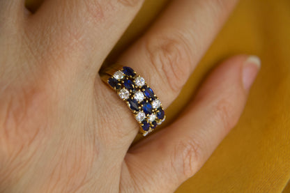 Anello fascia con zaffiri e diamanti