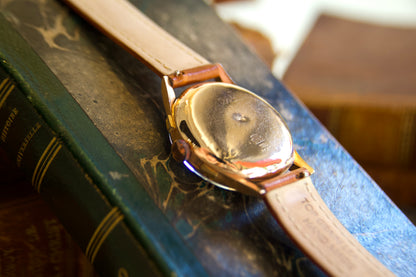 Orologio "Cronographe Suisse" anni 50 in oro 18kt