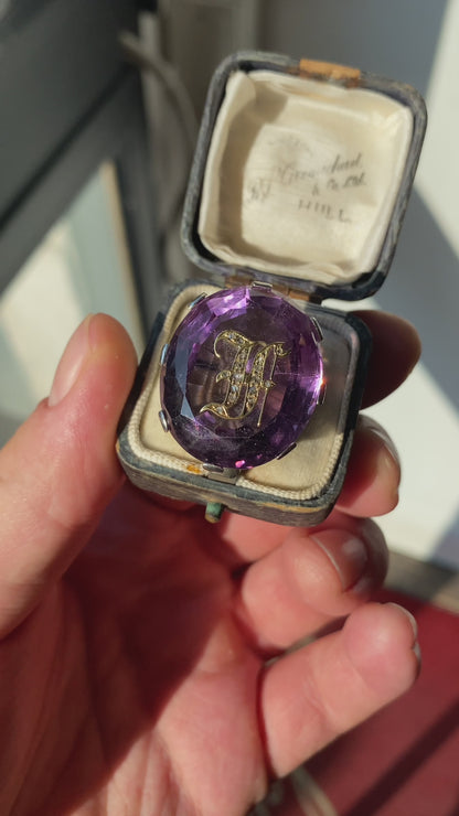 Ring with amethyst and monogram